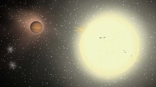 (Simulación por ordenador del planeta TrES-4, junto a su estrella.) (Foto: Jeffrey Hall, Lowell Observatory)